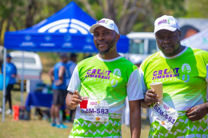 Cyclist and Runners